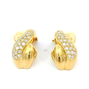 gelbgoldene damenohrclips in geschwungener form mit brillanten besetzt